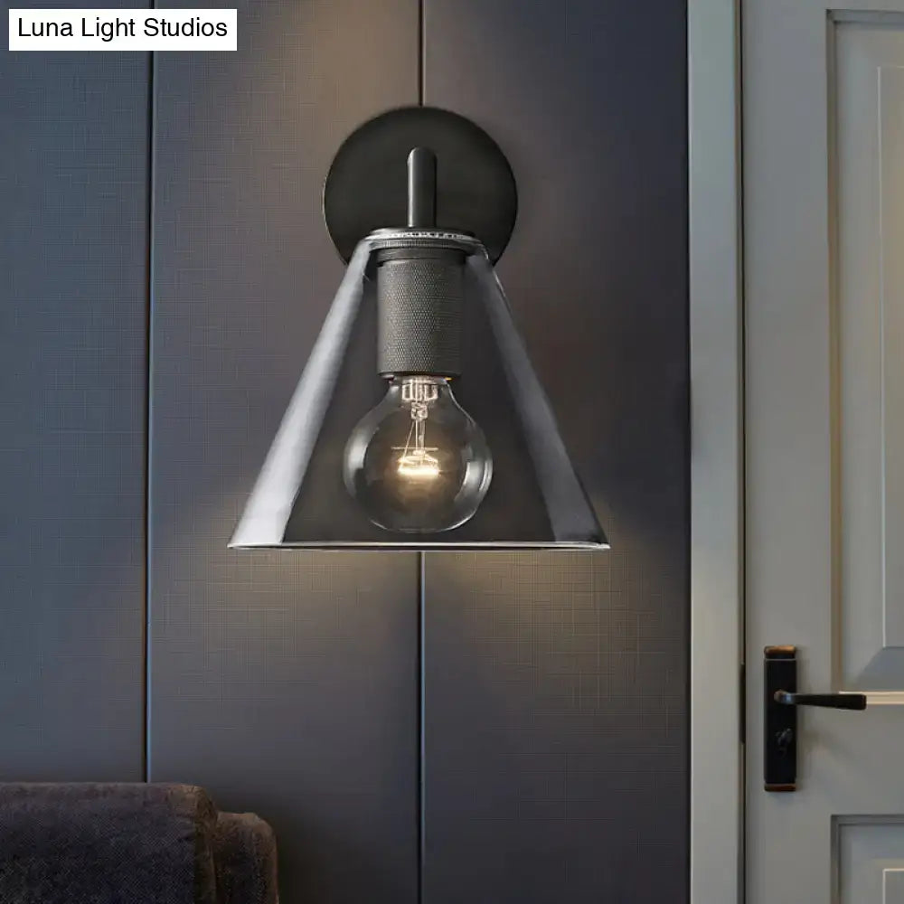 Modern black and brass glass cone wall light with matte black backplate and direct wired electric design for bedrooms