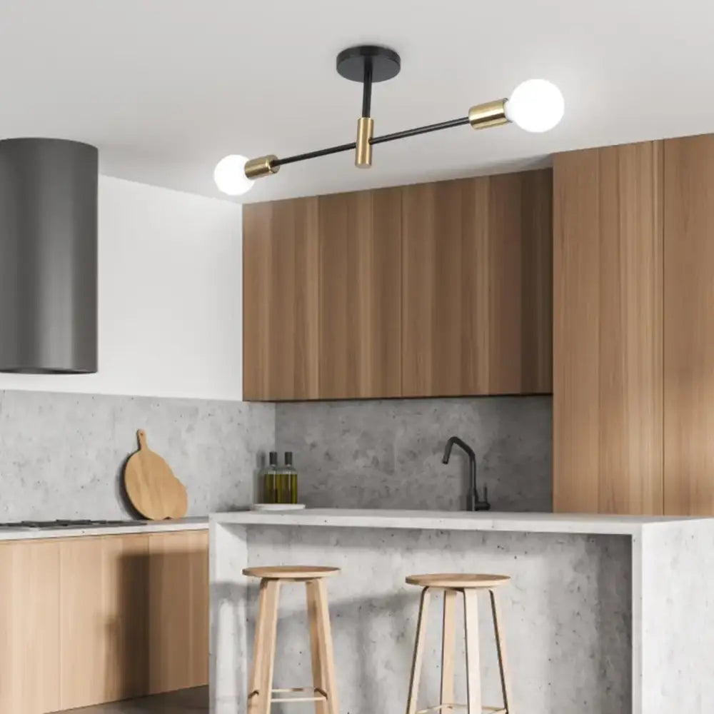 Modern black and brass decorbites industrial chandelier with two exposed globe bulbs for living room lighting
