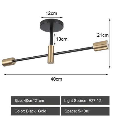 Modern black and brass iron wrought ceiling light fixture with two arms extending from a central rod for dining room decorbites