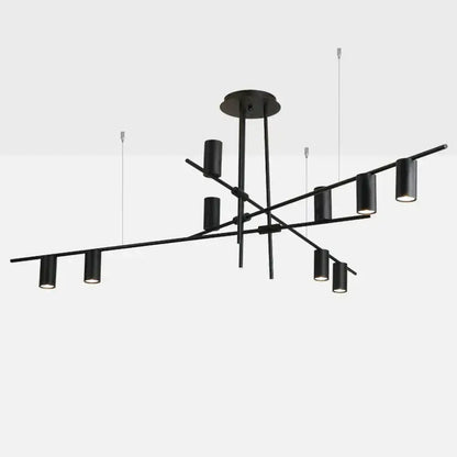 Modern black and brass minimalist dining room linear pendant light with black metal cylindrical fixtures in geometric pattern