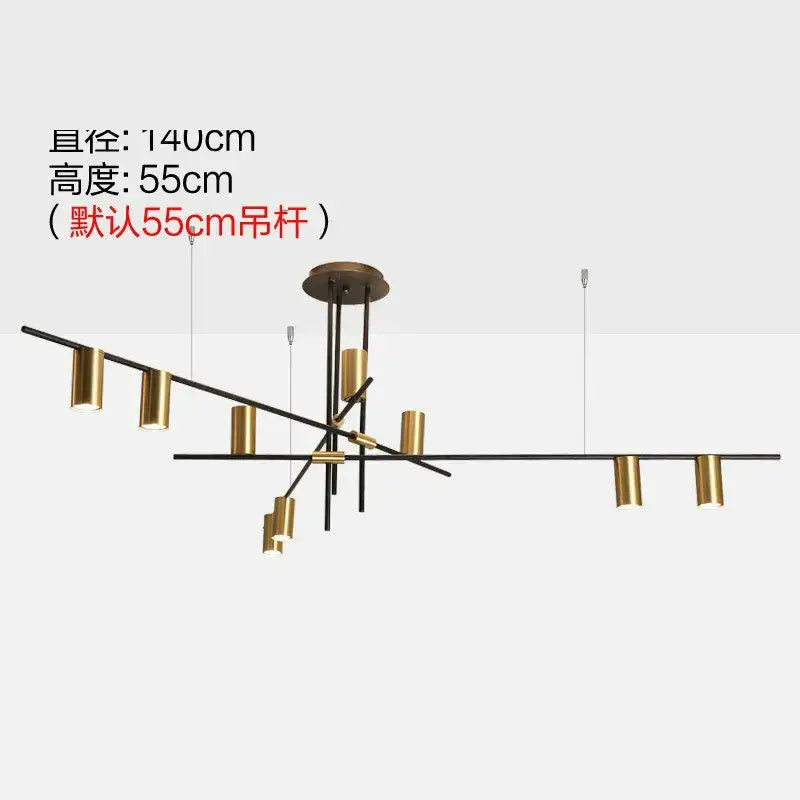 Modern black and brass minimalist dining room linear pendant light with geometric black metal arms and gold cylindrical shades