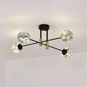 Modern black and brass decorbites™ starry nordic ball semi flush light fixture with four clear glass globes for living room ceiling