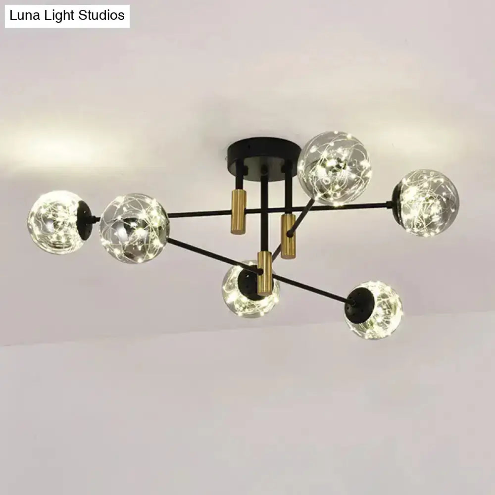 Modern black and gold nordic ball semi flush ceiling light fixture with six smoke glass spheres and string lights for living room