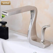 Stylish brushed stainless steel basin faucet with single handle and modern curves decorbites black brass design