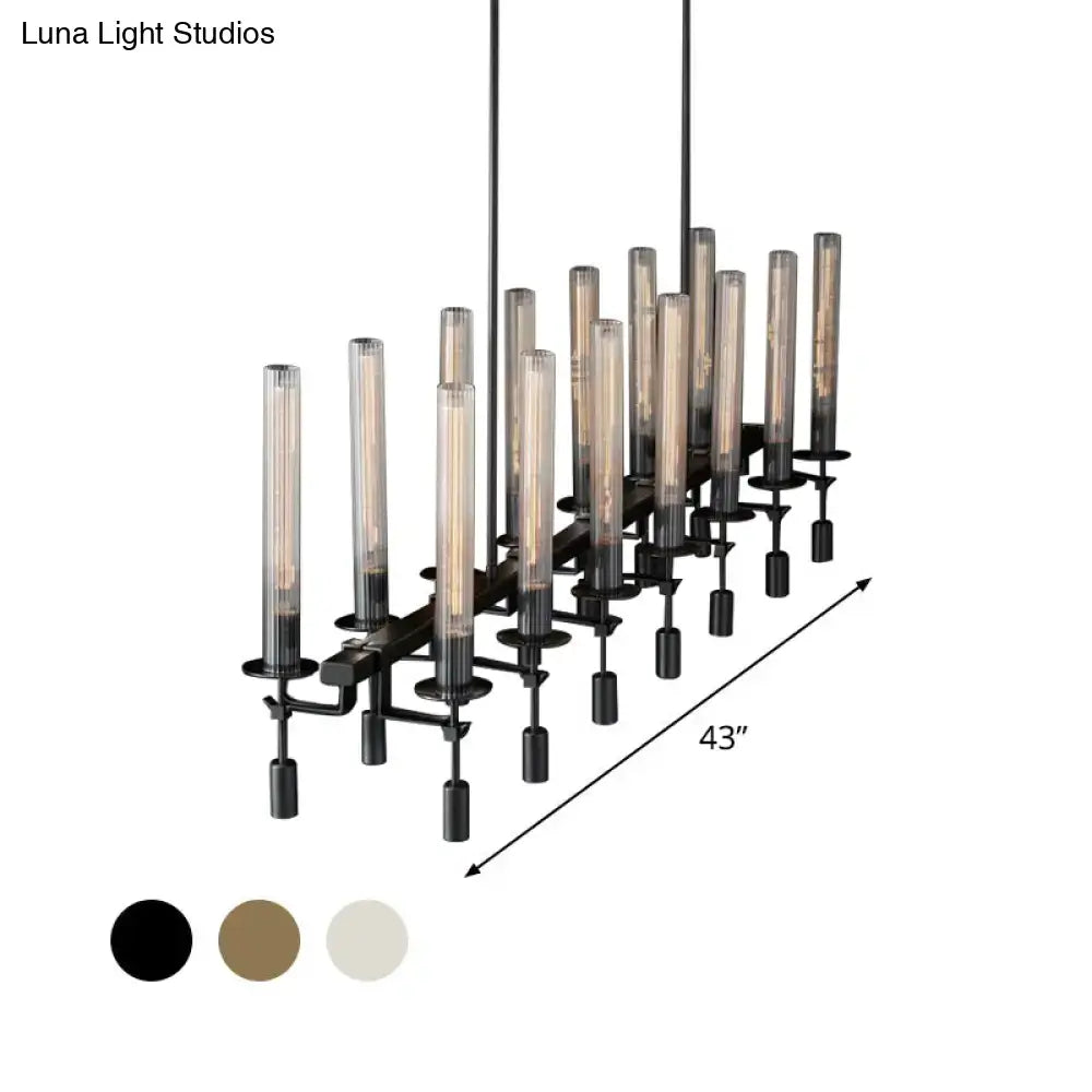 Black metal tube island chandelier with brass and nickel finish featuring cylindrical glass shades and exposed filament bulbs