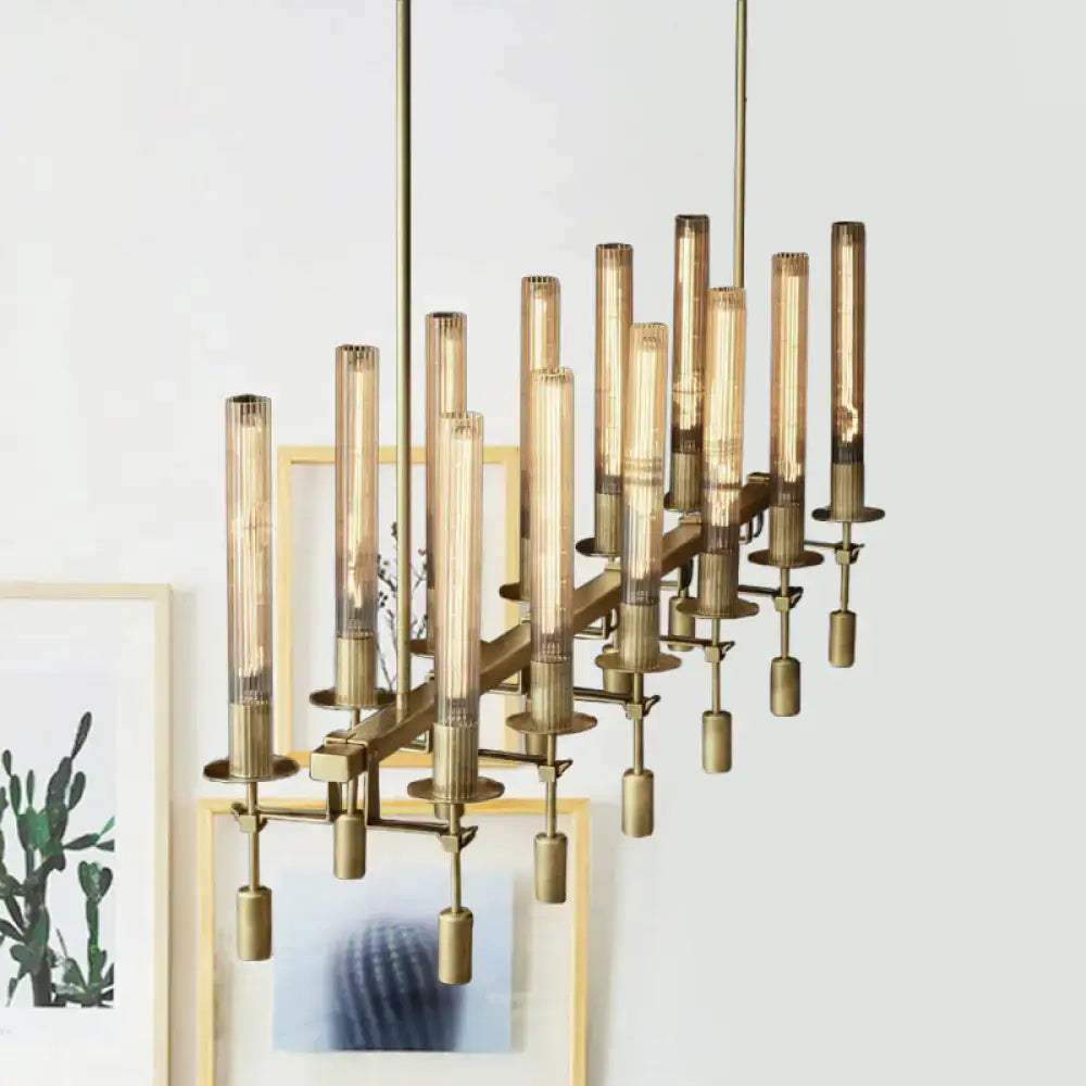 Decorbites modern black brass tube island chandelier with brass-toned frame and fluted glass cylindrical shades