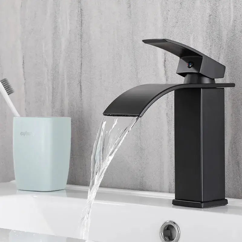 Modern black brass waterfall faucet with matte finish and single handle mixer for bathroom decorbites black brass design