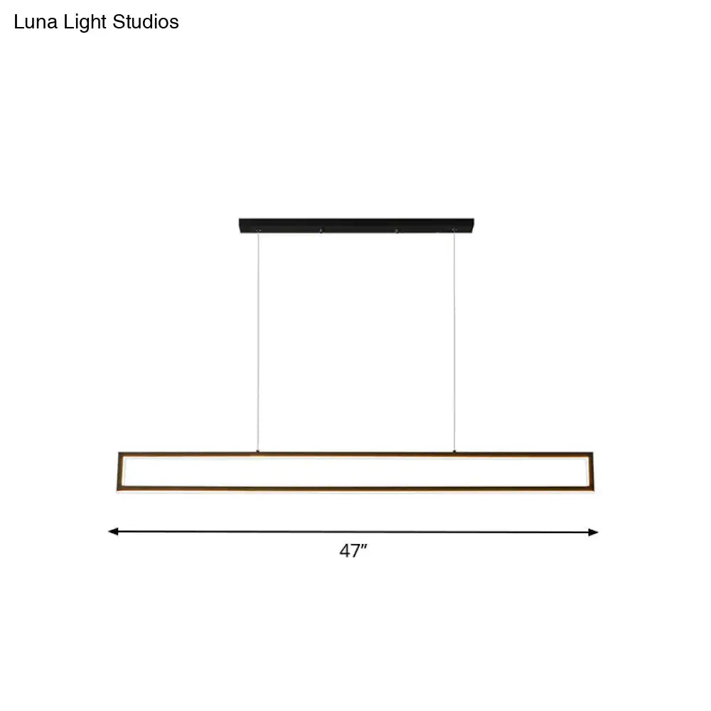 A sleek modern black and bronze rectangular led pendant with warm white light panel for dining room 220v-240v 110v-120v