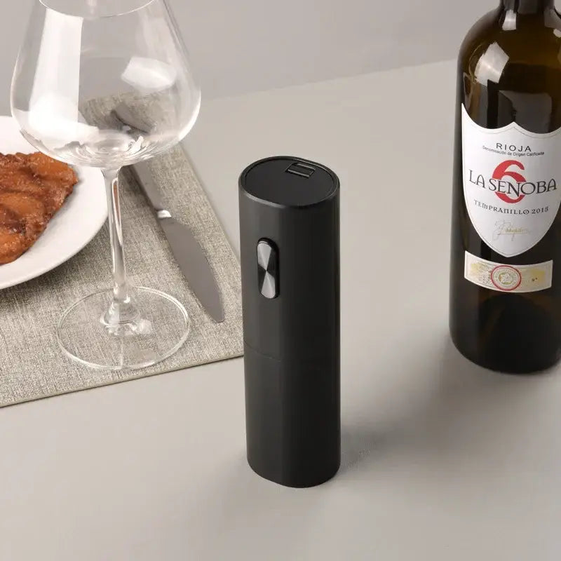 Modern black brushed metal electric wine opener with silver button and usb port for easy wine opening