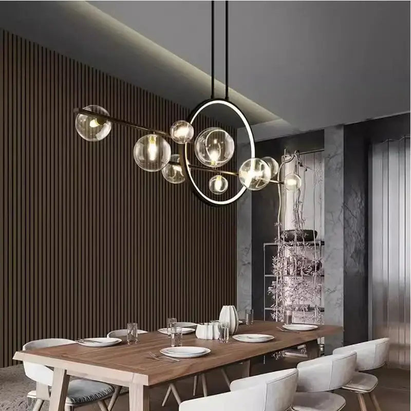 Modern black bubble glass pendant light with sleek metal frame and circular design for dining room decorbites bubble glass