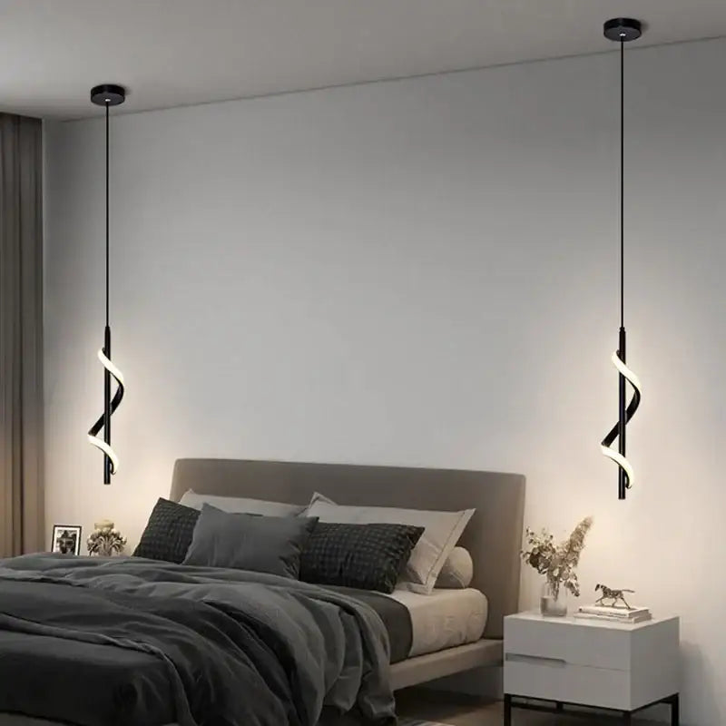 Modern black butterfly led pendant light with glowing accents works beautifully above a bedroom bed