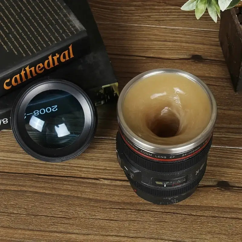 Modern black decorbites camera lens cup travel mug with silver rim and red accent text for self stirring coffee