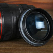 Modern black camera lens cup with red accent and textured grip by decorbites for kitchen self stirring coffee mug decorbites camera