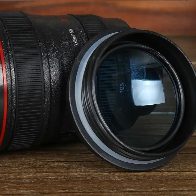 Modern black camera lens cup with red accent and textured grip by decorbites for kitchen self stirring coffee mug decorbites camera