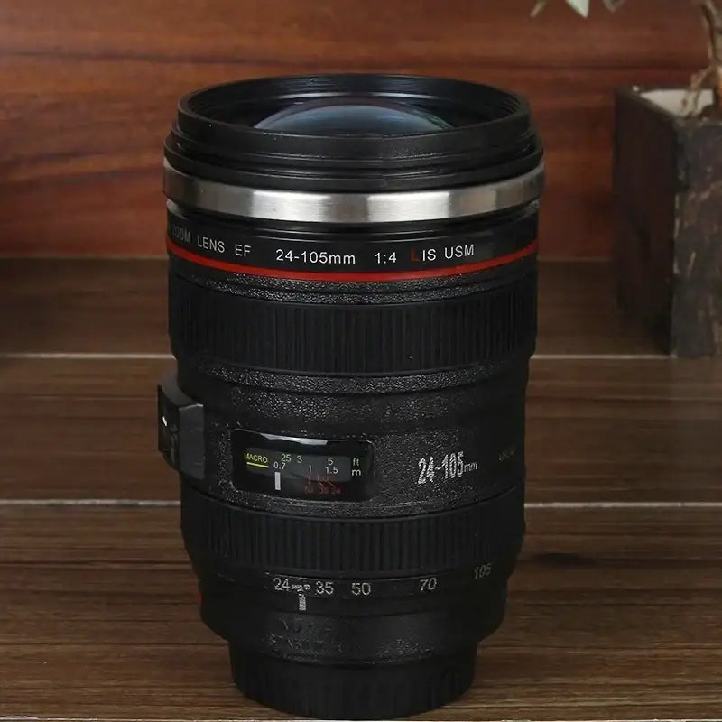 Modern black camera lens cup with silver ring and red accent featuring realistic 24-105mm markings decorbites camera lens
