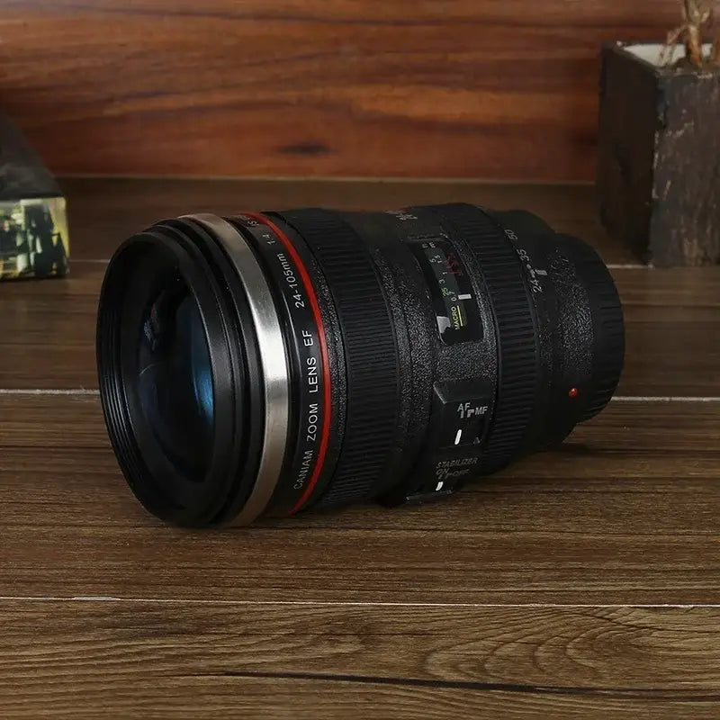 Modern black decorbites camera lens cup self stirring travel mug shaped like a canon ef 24-105mm zoom lens with red ring
