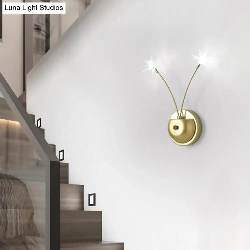 Modern black cast iron double globe wall sconce with gold-toned arms and star-shaped lights 15 inches fixture