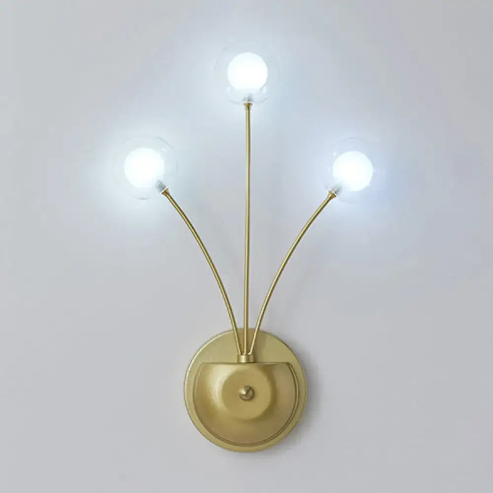 Modern black cast iron double globe wall sconce 18 inches fixture with brass finish and three clear glass globe bulbs
