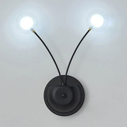 Modern black cast iron double globe wall sconce with two curved arms and clear bulbs for living room lighting fixture inches