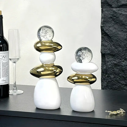 Modern black ceramic decorative crystal ball statue with glossy white resin base and polished gold mid-sections for decorbites decorative crystal decor