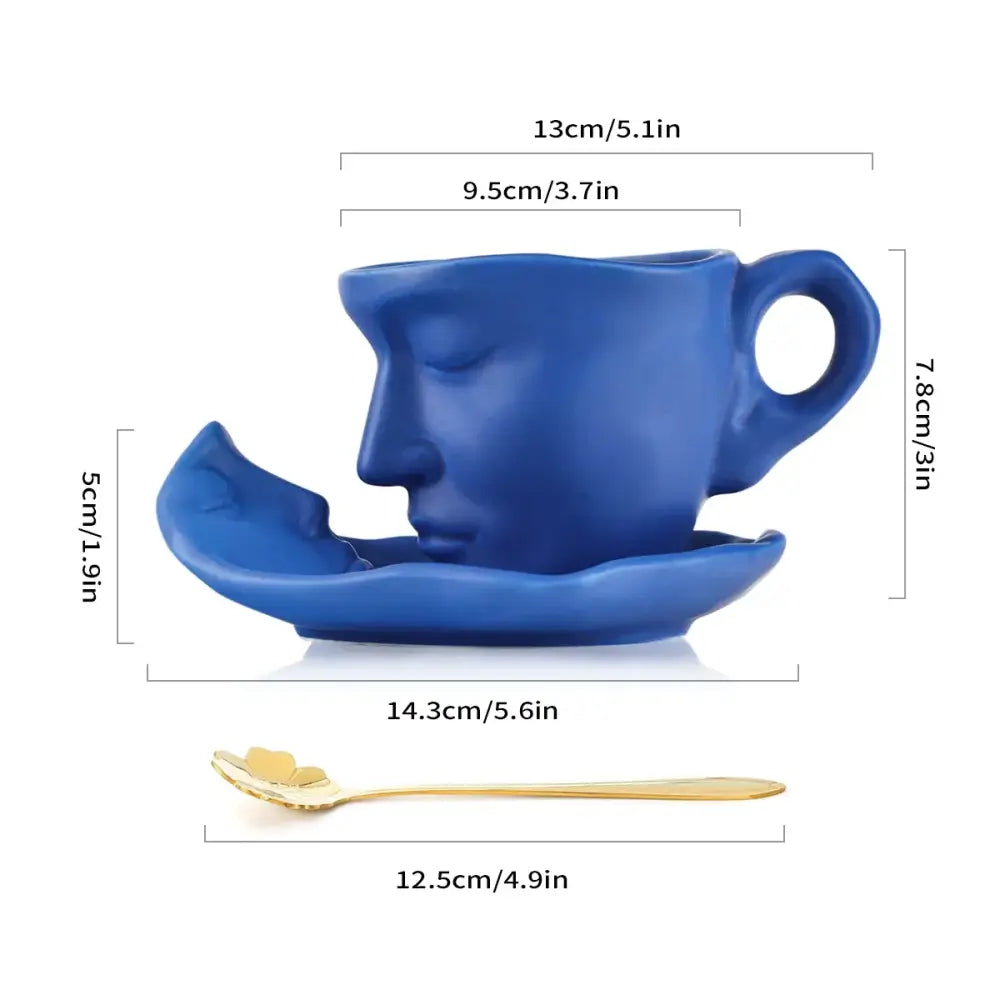 Modern black ceramic tea cup set with blue cup sculpted as serene sleeping face for dining room latte art
