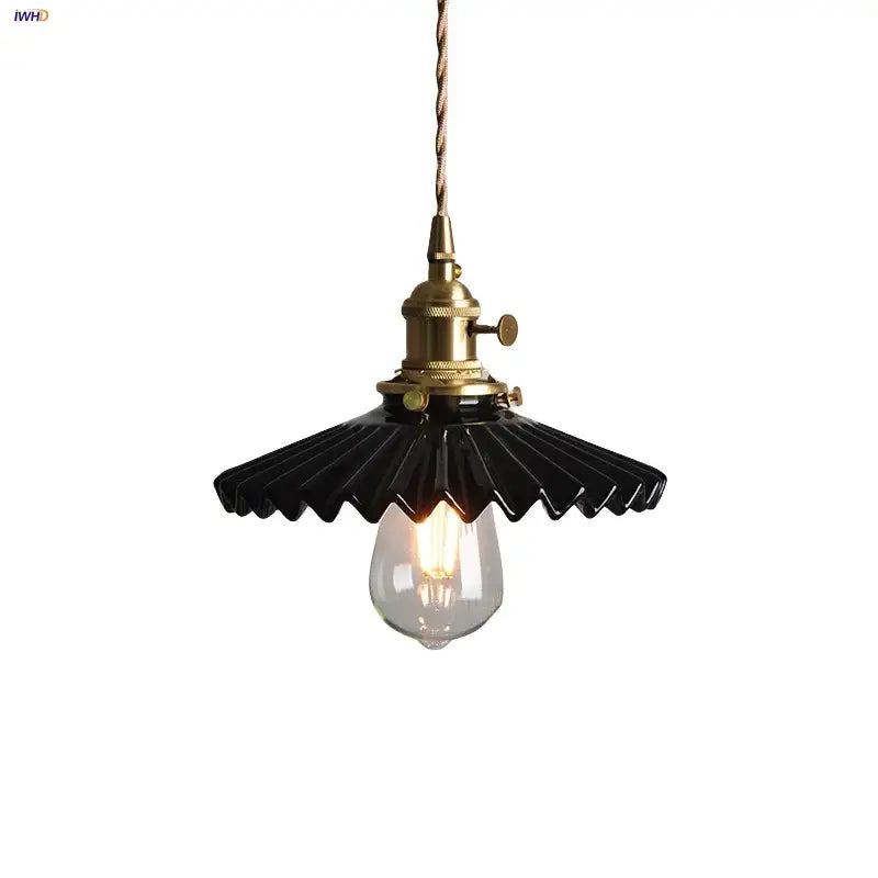 Modern black ceramic led pendant light with brass-finished socket and twisted cord for decorbites black ceramic decor