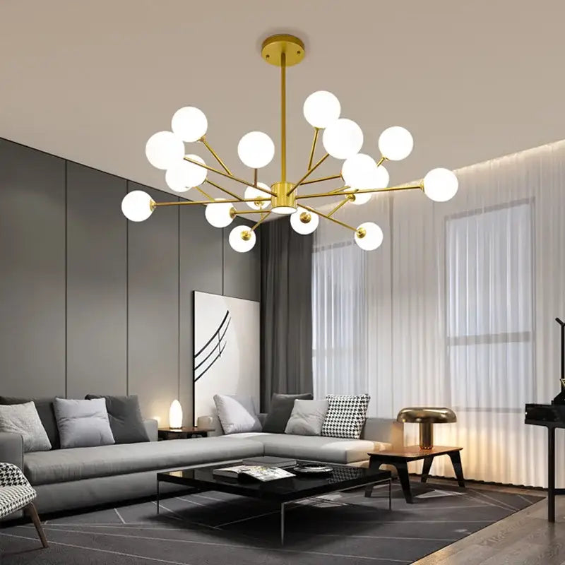 Modern black chandelier by decorbites with gold-toned frame and frosted glass globe bulbs for living room decor