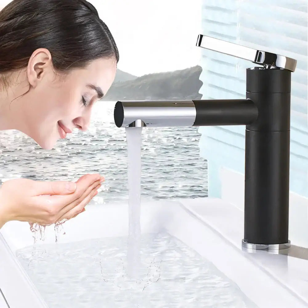 Modern black and chrome brass bathroom faucet with sleek cylindrical design for bathroom faucet vessel use