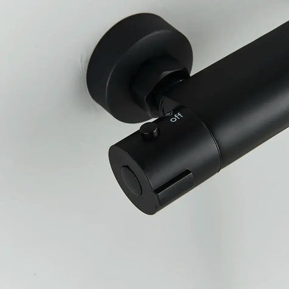 Modern black chrome brass shower set with black matte cylindrical wall-mounted light fixture featuring off switch