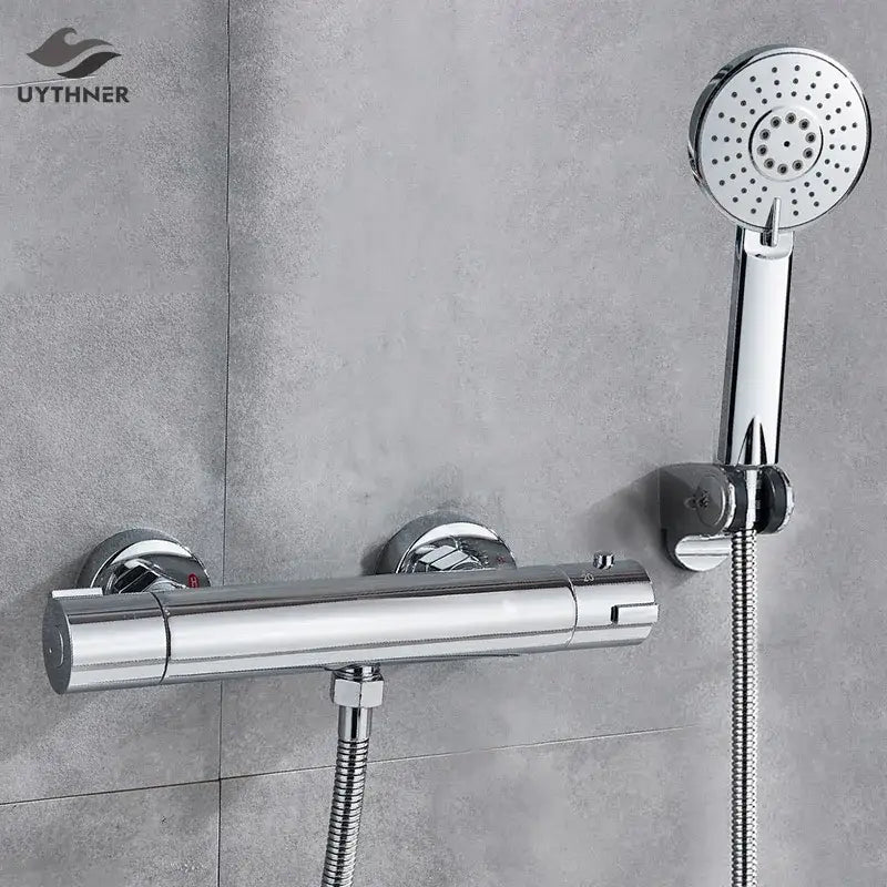 Modern black and chrome brass shower set with chrome finished handheld nozzle and integrated temperature control valve decorbites black chrome