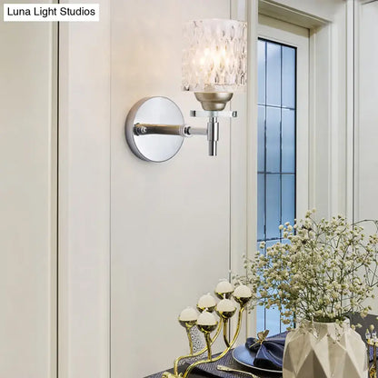 Modern black chrome wall sconce with dimpled glass cylinder shade and brushed nickel finish for bedroom lighting