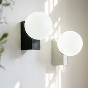 Modern black and chrome glass ball wall sconce with frosted white spherical shades for bedroom decorbites glass ball light