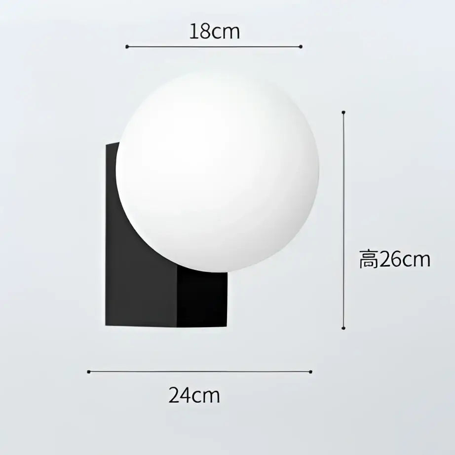 A modern black and chrome matte white glass ball wall sconce with a spherical globe for bedroom decorbites glass ball lighting
