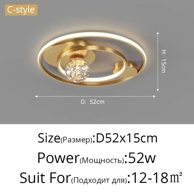 Gold-colored modern ceiling light with concentric rings and crystal globe in decorbites gypsophila chandelier style