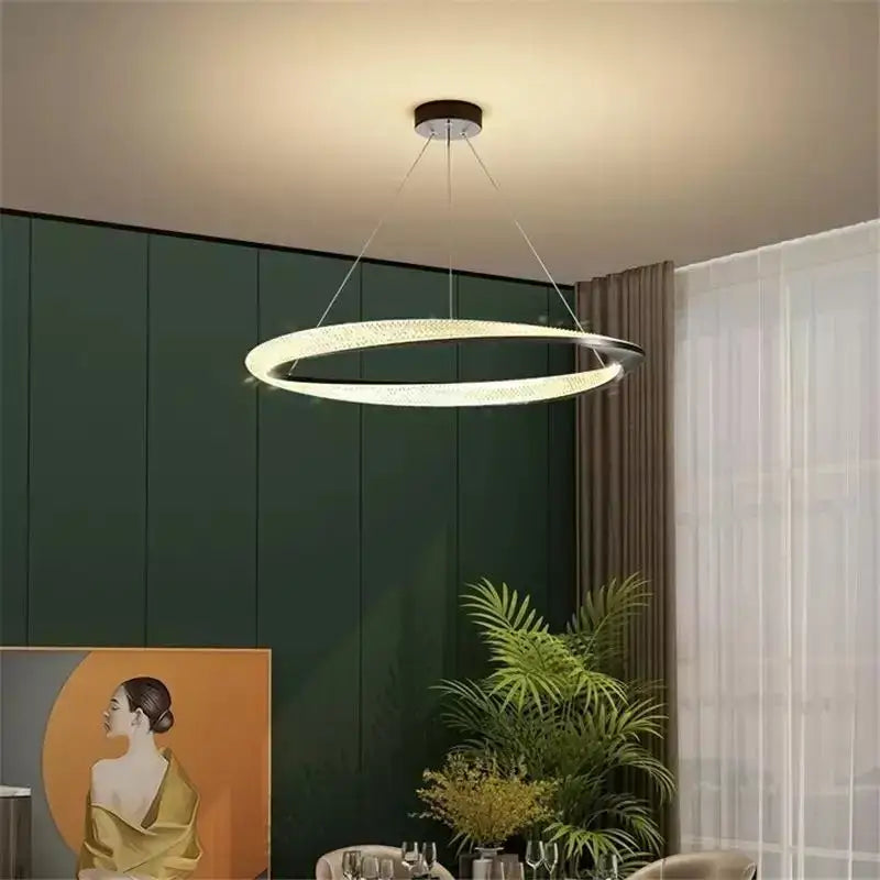 Modern black circle chrome chandelier pendant light with two concentric led rings emitting warm glow decorbites black circle