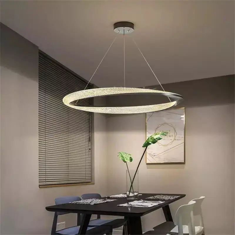 Modern black circle chrome chandelier with clear crystal outer ring and inner metallic band for living room decorbites black circle