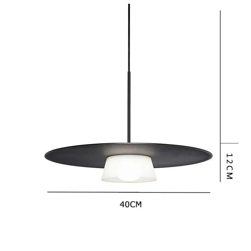 Modern black circular coffee shop pendant light with sleek metal shade and frosted glass diffuser by decorbites circular coffee