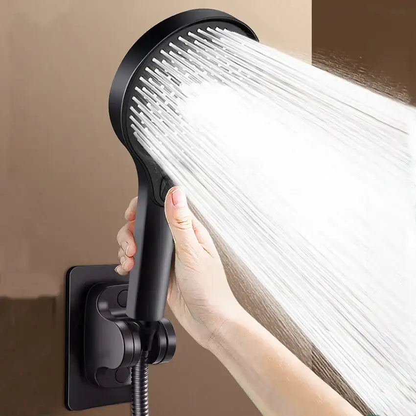 Modern black decorbites circular high pressure shower head with matte finish and multiple nozzles spraying water