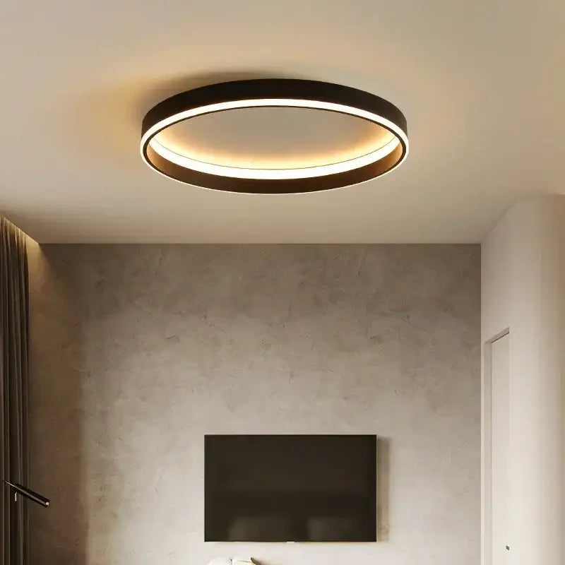 Modern black circular led ceiling light with sleek frame and warm ambient glow for living room decorbites circular led ceiling lights