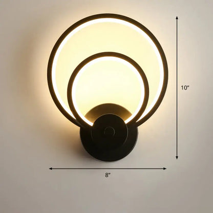 Modern black circular led light fixture wall sconce with two illuminated rings and remote control for bedroom use