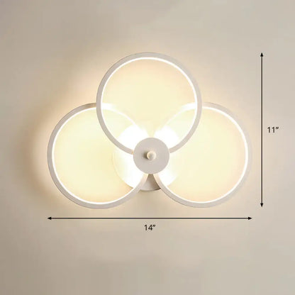 Modern black circular led light fixture with three overlapping illuminated rings wall sconce with remote control