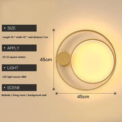 Modern gold-toned circular led wall lamp with concentric rings providing a warm diffused glow for minimalist spaces