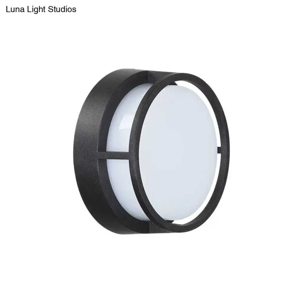 Modern black circular led wall lamp with matte finish frosted glass panel providing warm color outdoor lighting