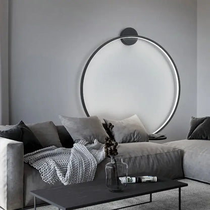 Modern black circular led wall lights with sleek frame providing warm bedroom lighting decorbites led wall solution