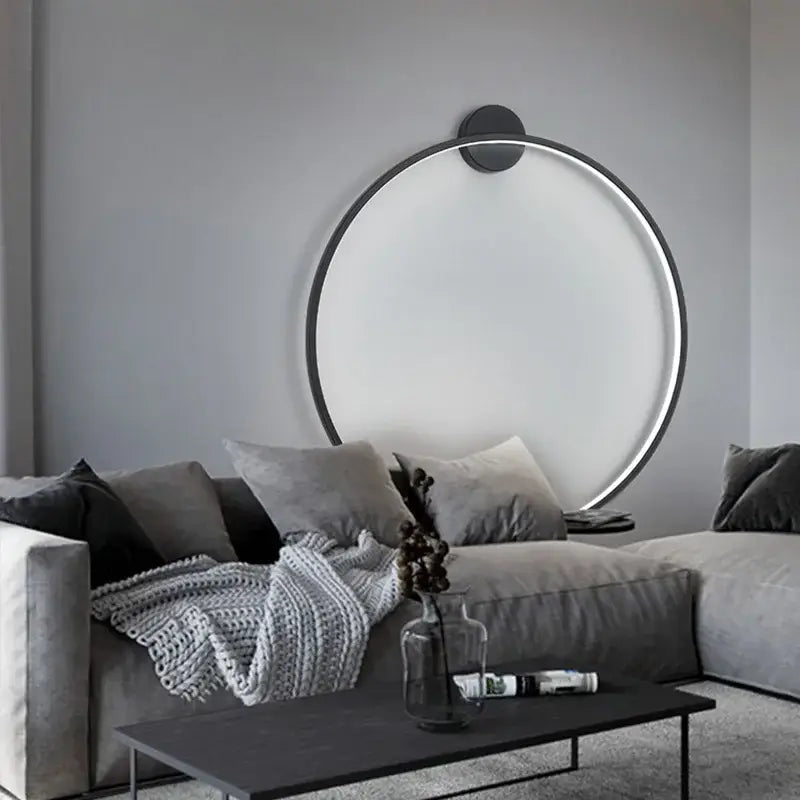 Modern black circular led wall lights with sleek frame providing warm bedroom lighting decorbites led wall solution