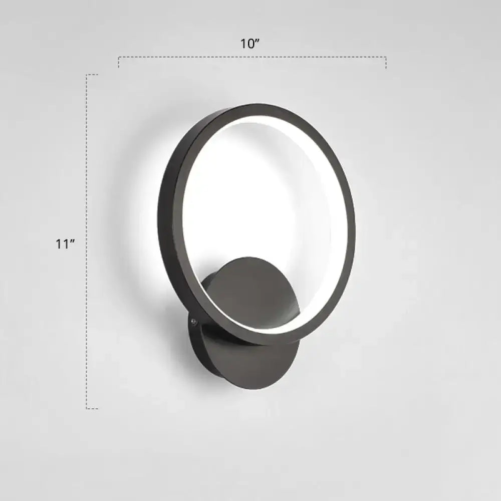 Modern black circular led wall sconce light fixture with a sleek minimalist design and illuminated ring, inches high