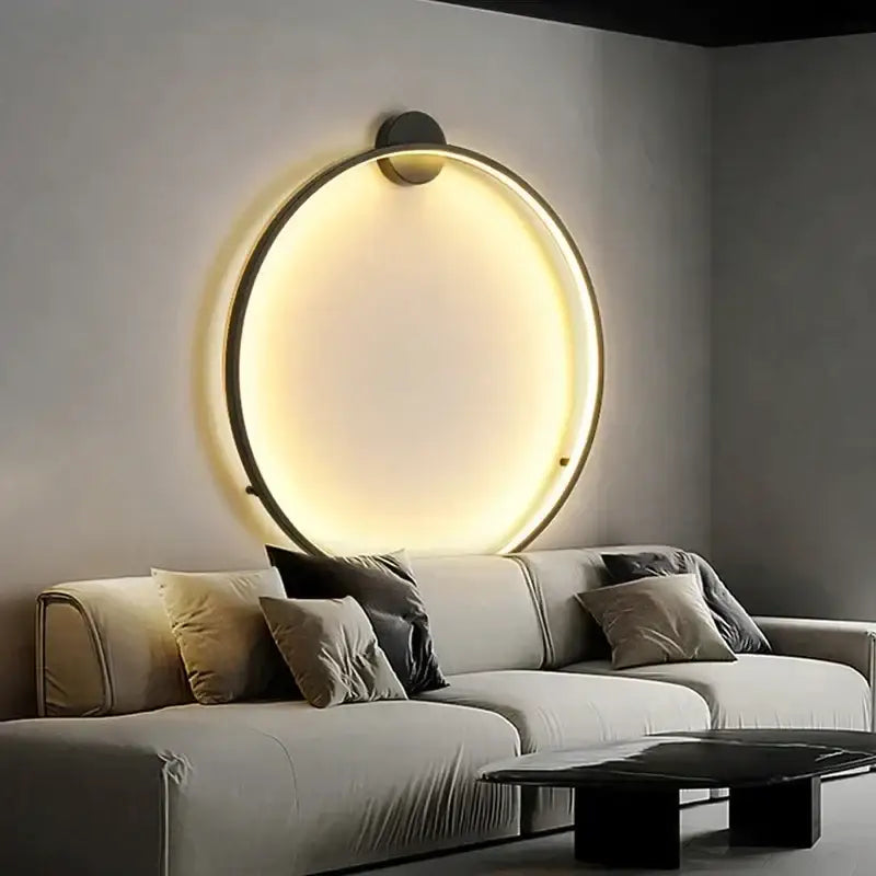 Modern black circular wall lamp with sleek metallic frame warm glowing illumination for living room decorbites circular wall lamp