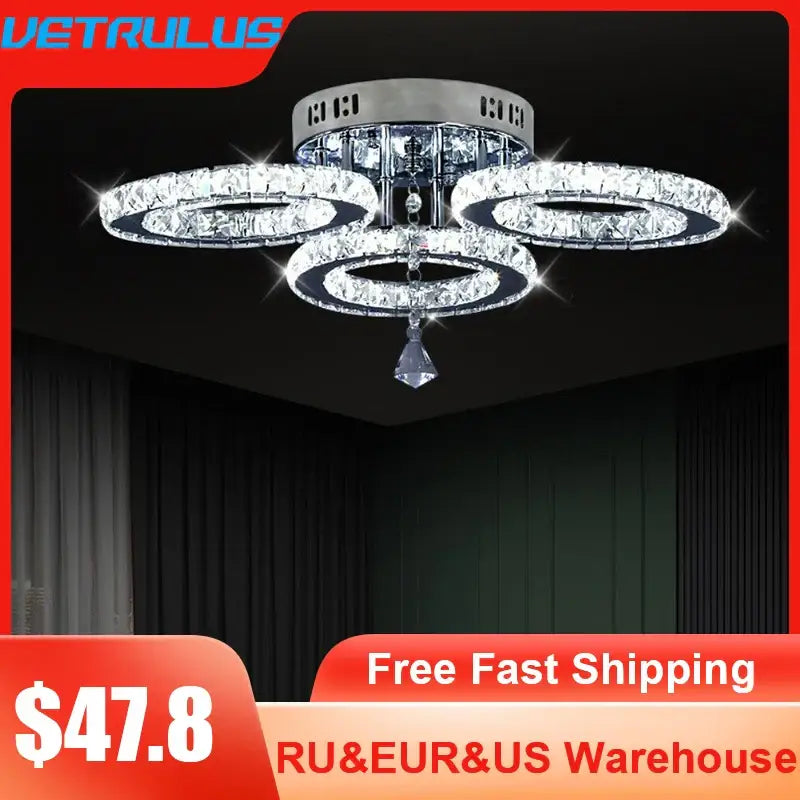 Modern black and clear crystal led ceiling chandelier with sleek chrome finish and cascading light rings by decorbites