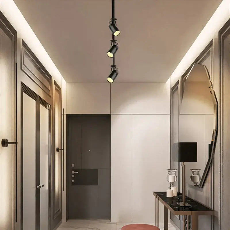 Black adjustable spotlights on a ceiling track featuring decorbites colorful rgb led for ktv stage decoration