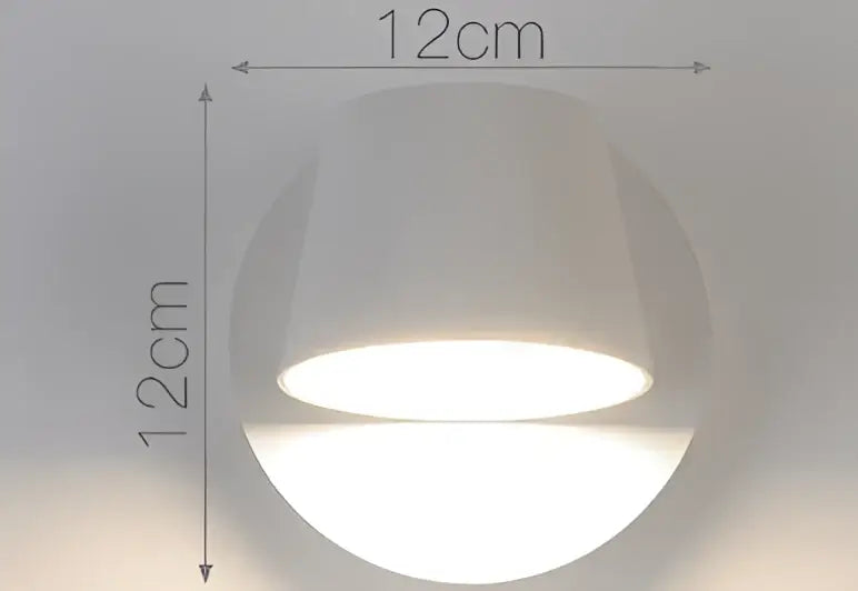Modern black conical led wall lamp featuring a sleek white circular 12cm led wall light with soft diffused illumination